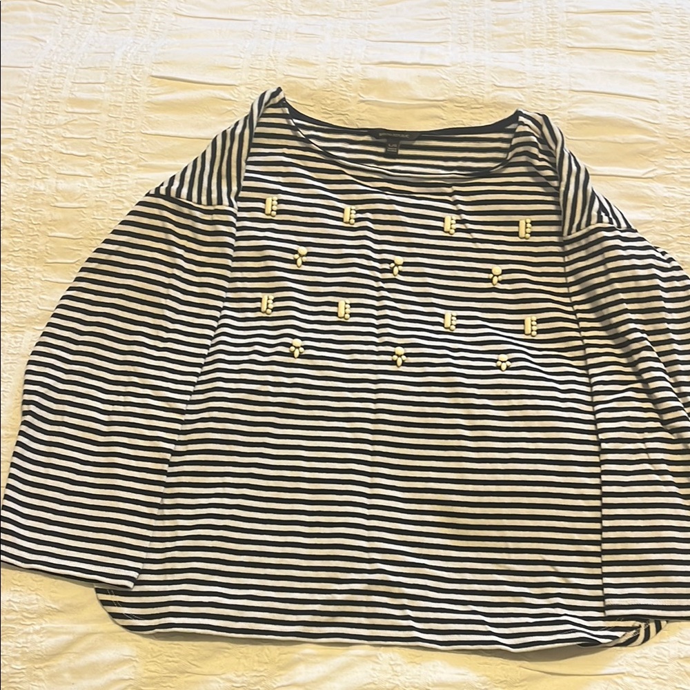 Striped Black and White Top with Gold Accents